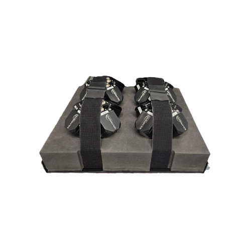 Gray foam cushion with black straps and buckles